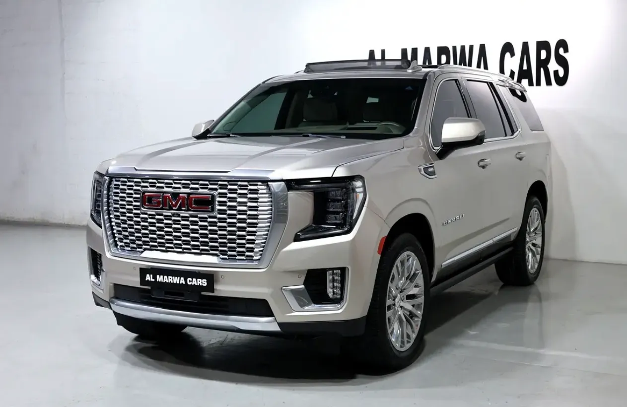 Presenting a luxurious 2023 GMC Yukon Denali - in immaculate condition -GCC spec  -UNDER WARRANTY & SERVICE - Thumbnail 2